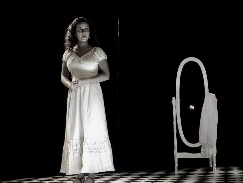 actor onstage at the Warwick Ancient Drama Festival performance of Medea