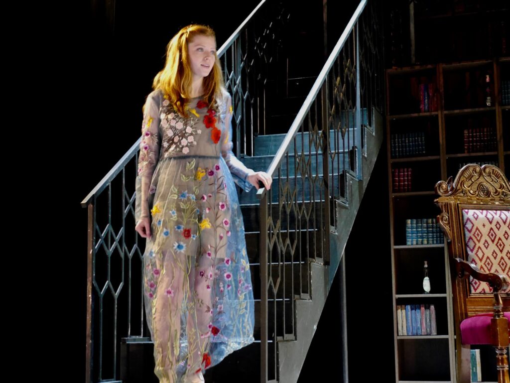 actor onstage at the Warwick Ancient Drama Festival performance of Medea