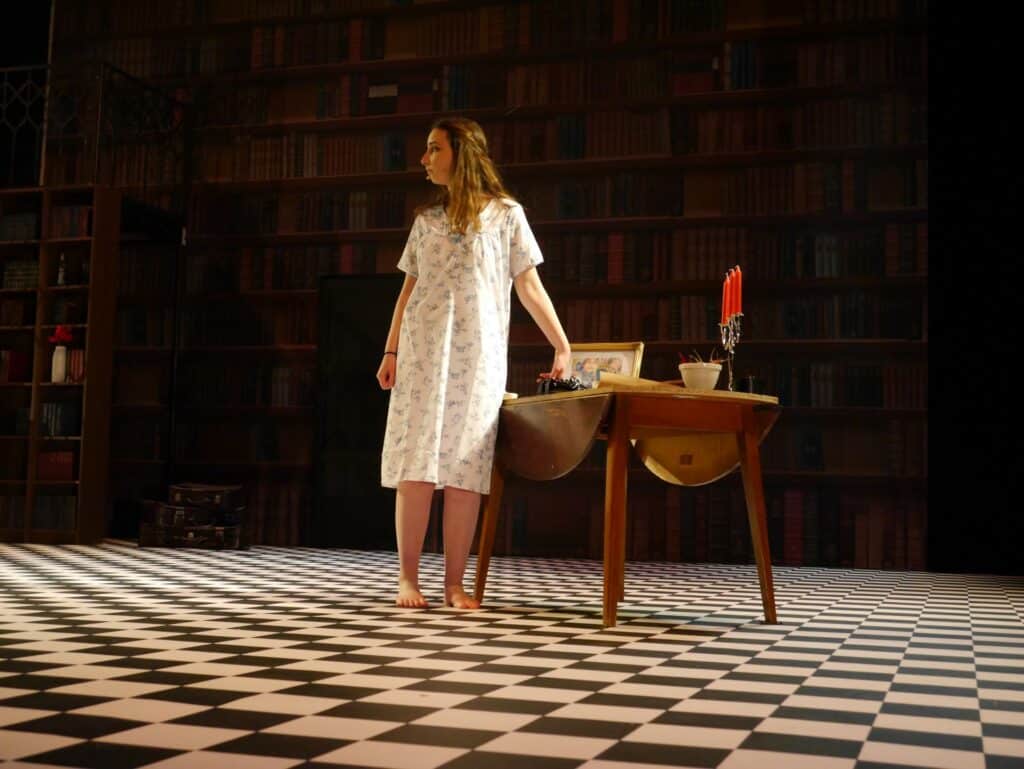 protagonist onstage at the Warwick Ancient Drama Festival performance of Medea