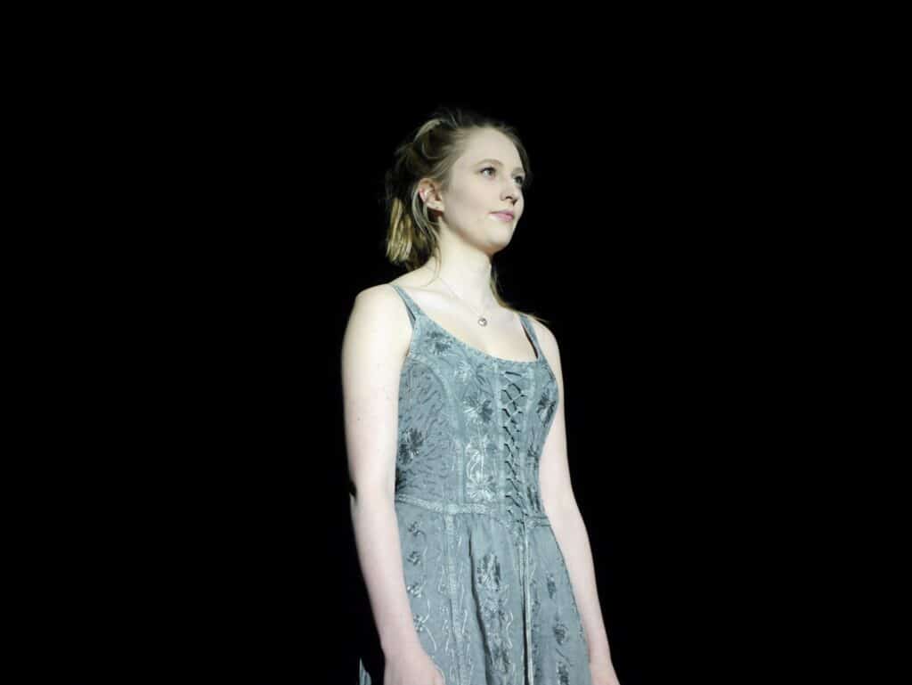 actor onstage at the Warwick Ancient Drama Festival performance of Medea