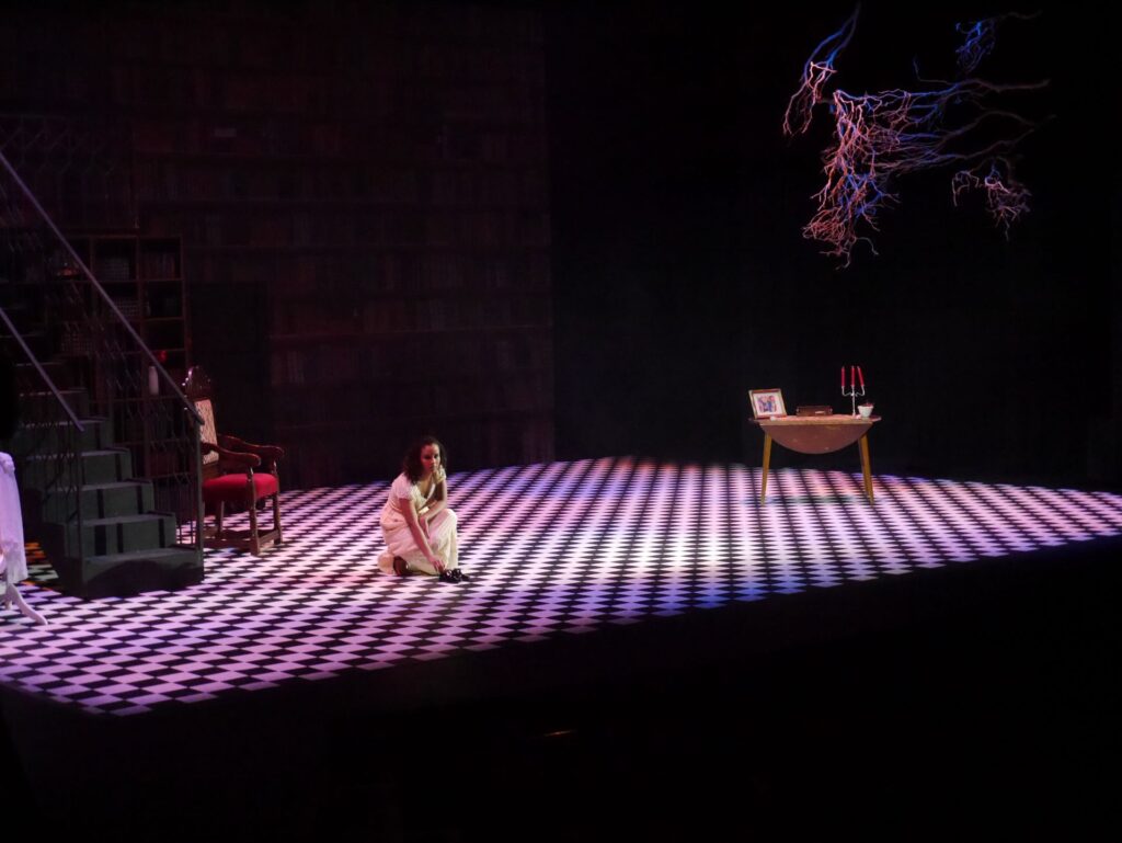 actor onstage at the Warwick Ancient Drama Festival performance of Medea