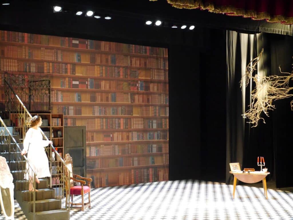 actor onstage at the Warwick Ancient Drama Festival performance of Medea