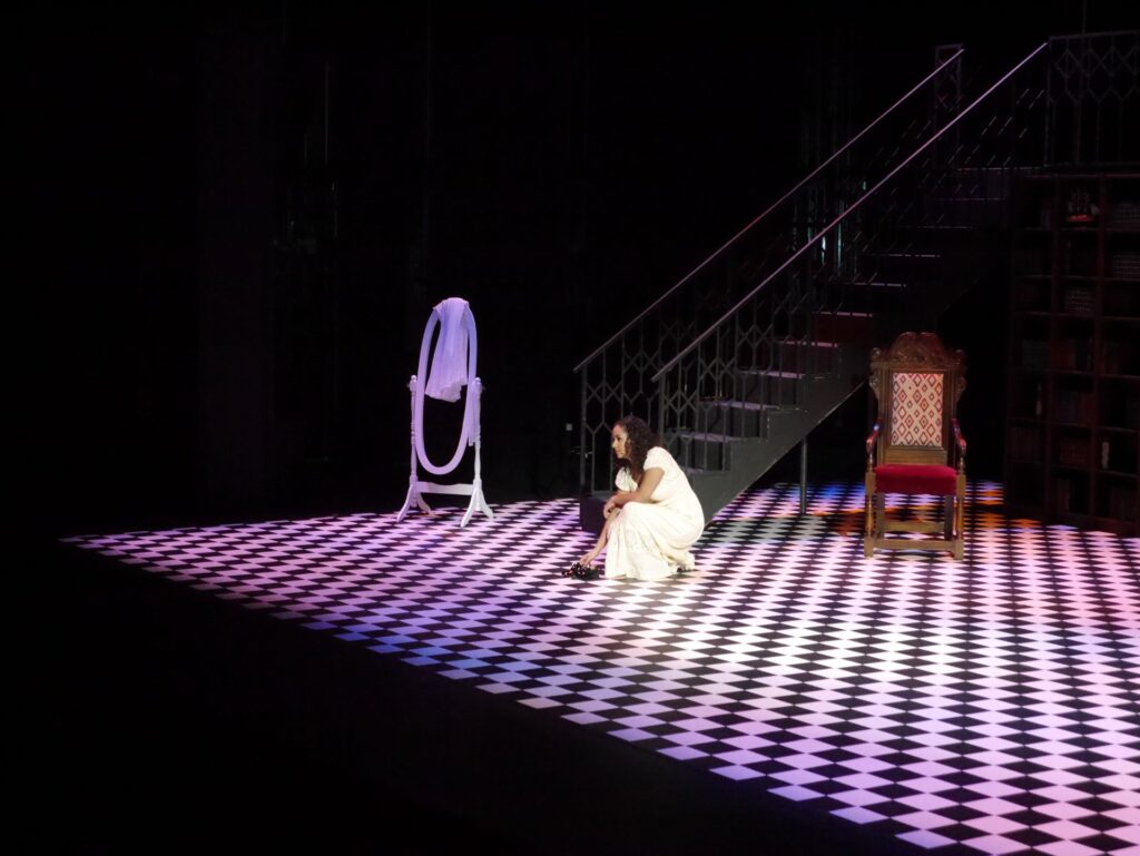 actor onstage at the Warwick Ancient Drama Festival performance of Medea