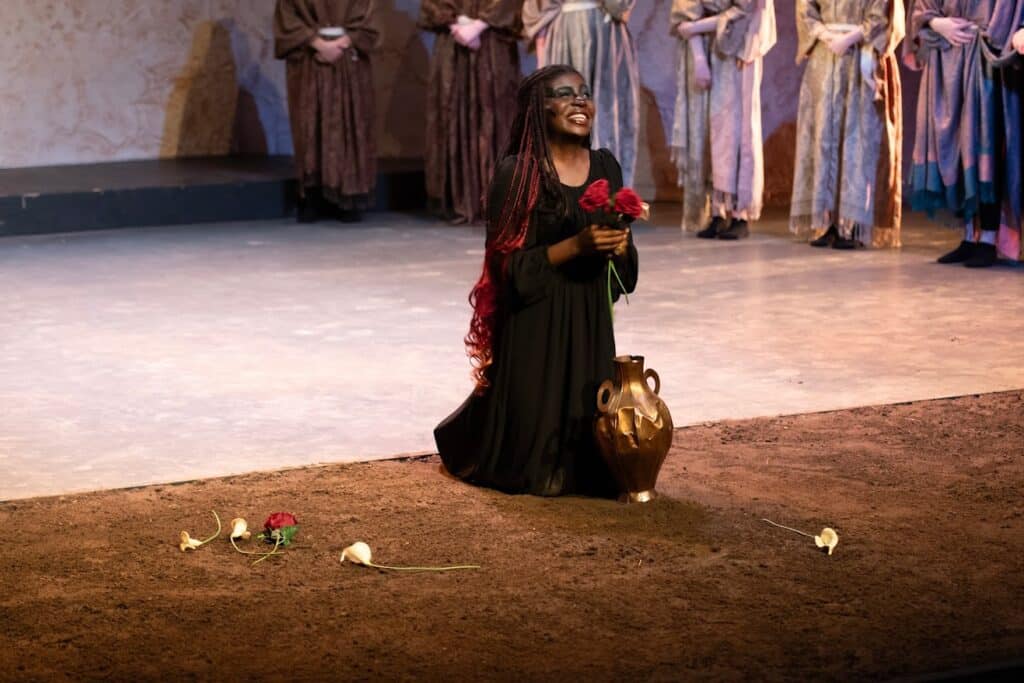 still of protagonist on stage at Warwick Ancient Drama Festival performing in Aeschylus' The Persians