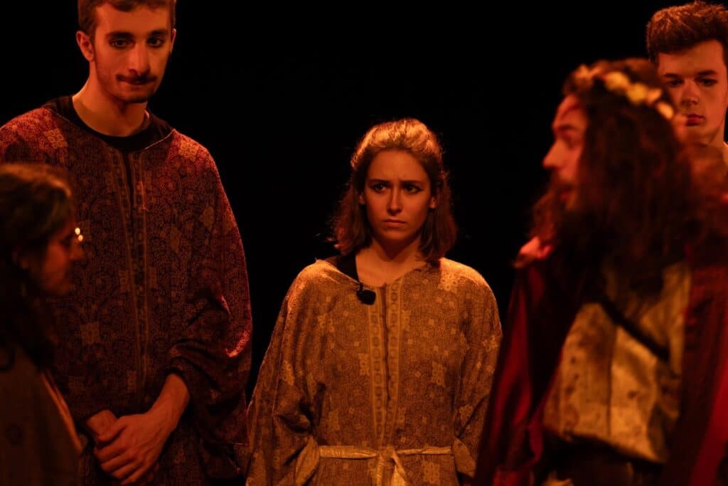still of actors on stage at Warwick Ancient Drama Festival performing in Aeschylus' The Persians