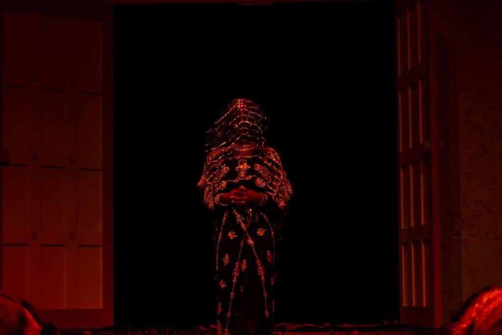 still of protagonist on stage at Warwick Ancient Drama Festival performing in Aeschylus' The Persians