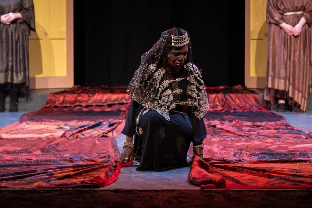 still of protagonist on stage at Warwick Ancient Drama Festival performing in Aeschylus' The Persians