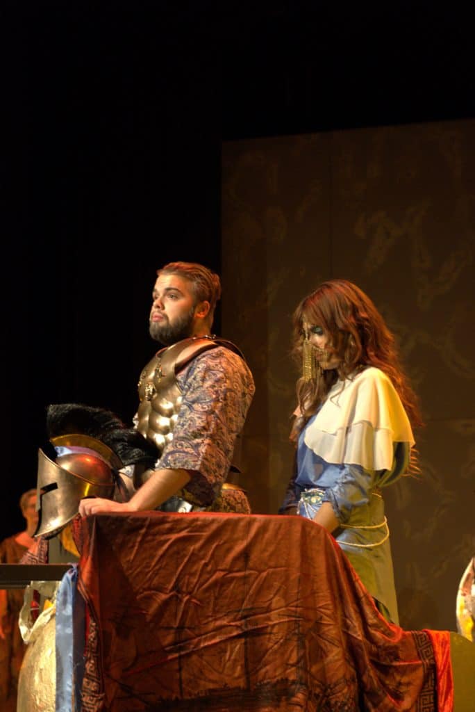 Agamemnon and Cassandra in chariot, Agamemnon speaking of his conquest at Troy